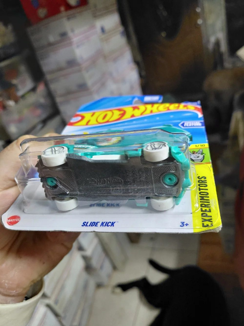 teal Hot Wheels Slide Kick from the 2025 Experimotors series (1/10, #116/250)